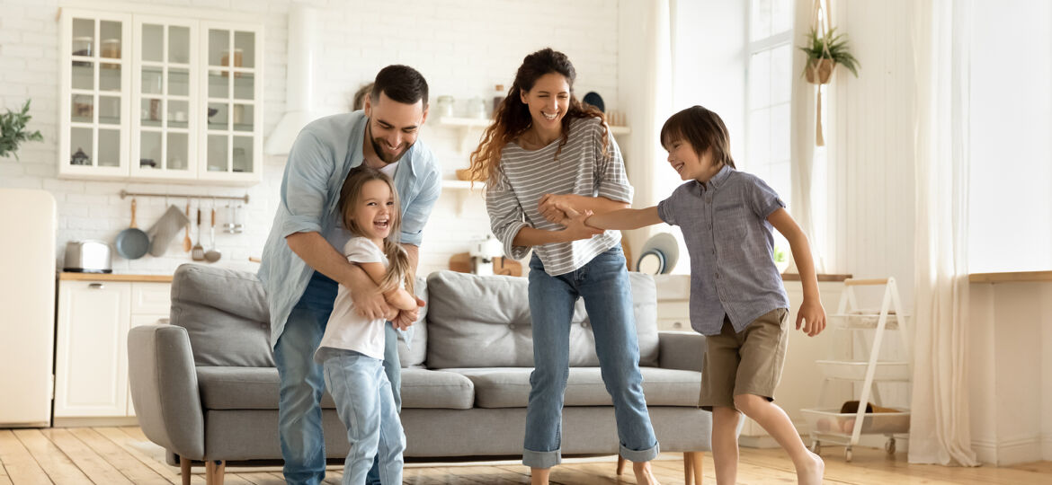 Happy Family Playing Funny Game Having Fun Together.